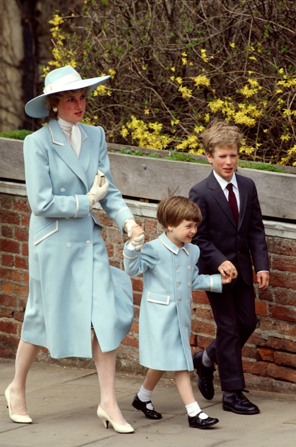 Princess Diana and Prince William match in blue and white Catherine Walker coats in 1987, attending an Easter service with Peter Phillips.