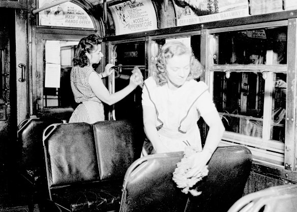"New Australians" clean trams at Waverley Depot on 20 April 1951. 
