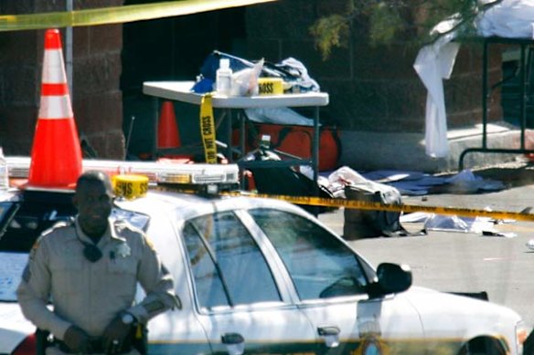 The scene of the shooting in Tucson, Arizona, in which five people were killed and a US congresswoman was shot in the head.