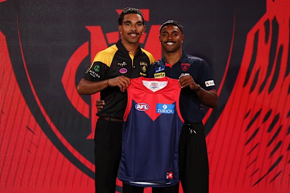 Dynamic duo: Latrelle Pickett received his Demons jumper from cousin Kysaiah.