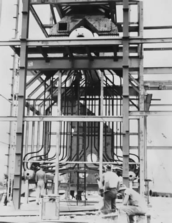 Workers instal the boilers during construction of the boiler house, circa 1926.