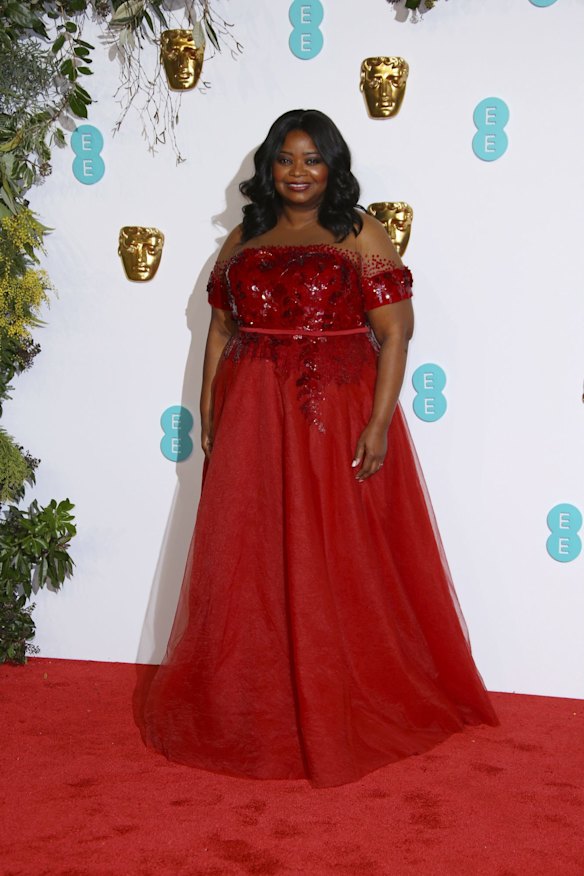 Actress Octavia Spencer poses for photographers upon arrival at the BAFTA awards in London.