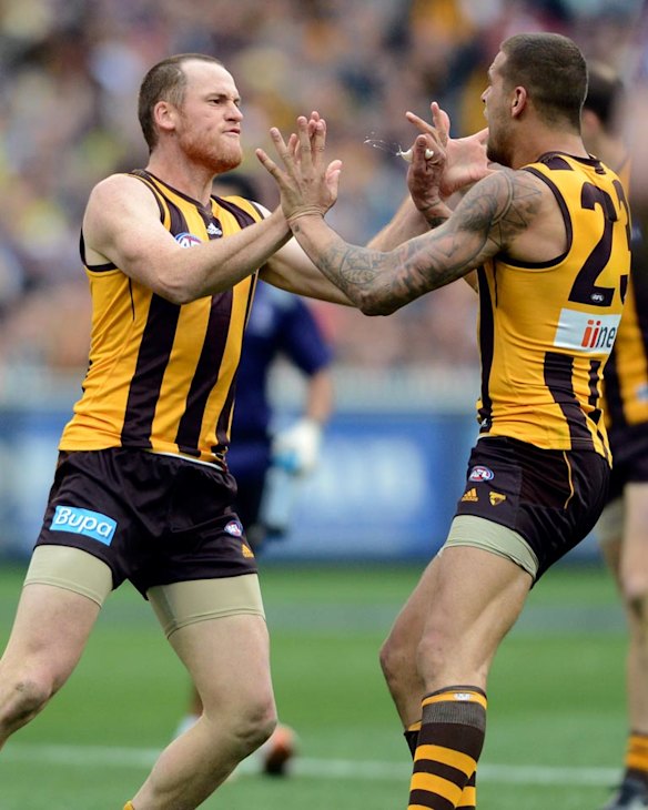 With long-time forward line teammate Jaryd Roughead during the grand final.