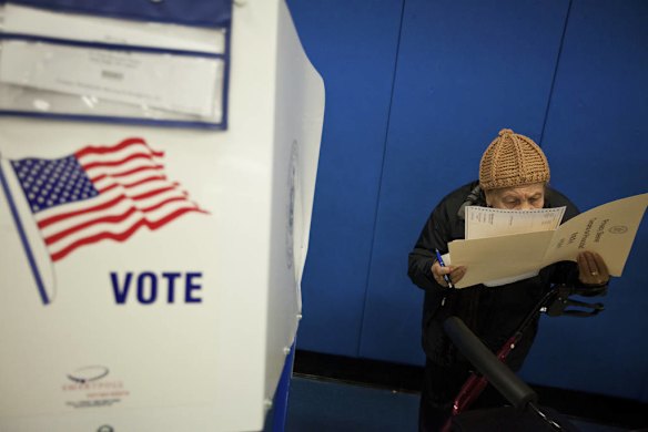 Ramonita Santana prepares to cast a ballot in New York on Election Day 2012.
