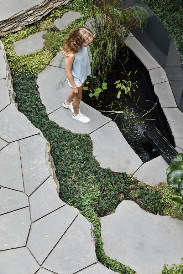 The sunken pond in the middle of the house.