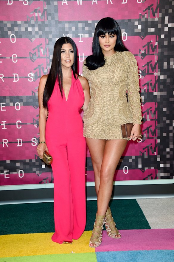 LOS ANGELES, CA - AUGUST 30:  TV personalities Kourtney Kardashian (L) and Kylie Jenner attend the 2015 MTV Video Music Awards at Microsoft Theater on August 30, 2015 in Los Angeles, California.  (Photo by Frazer Harrison/Getty Images)