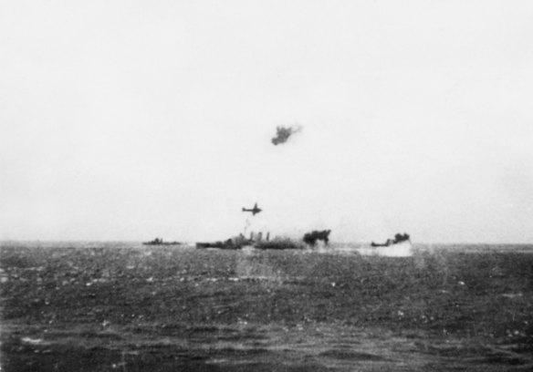 The HMAS Australia, a joint Australian-United States naval Task Group, under air torpedo attack by Imperial Japanese Navy land-based bombers during the Battle of the Coral Sea on 7 May 1942.