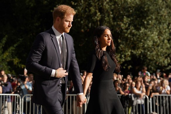 Meghan, Duchess of Sussex and Prince Harry meet members of the public at Windsor Castle, following the death of Queen Elizabeth II. 