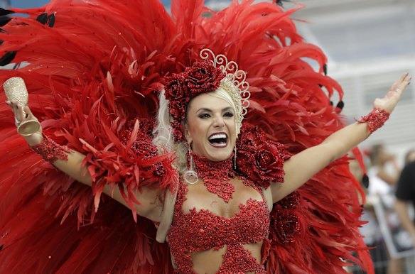 A dancer from the Gavioes da Fiel samba school performs during a carnival parade in Sao Paulo, Brazil.