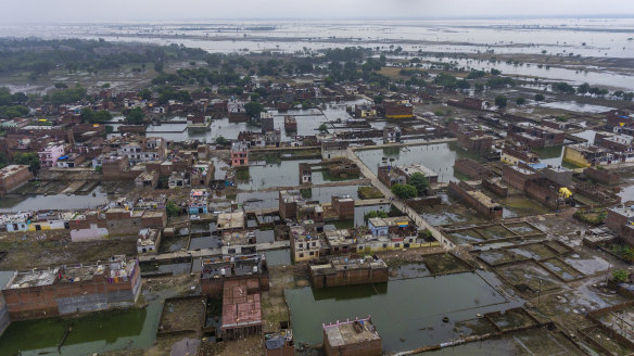 Houses are inundated with floodwaters in Prayagraj.