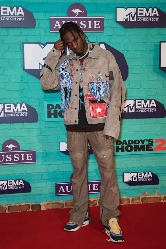 Travis Scott poses for photographers upon arrival at the MTV European Music Awards 2017.
