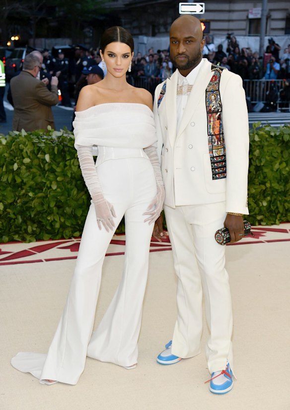 Kendall Jenner, left, and Virgil Abloh attend The Metropolitan Museum of Art's Costume Institute benefit gala celebrating the opening of the Heavenly Bodies: Fashion and the Catholic Imagination exhibition on Monday, May 7, 2018, in New York. 