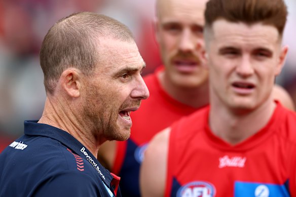 Simon Goodwin and forward Bayley Fritsch need to find a way forward.
