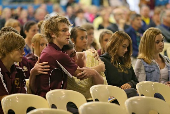 Friends and family arrive for the service.