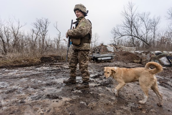 A Ukrainian soldier walks along a line of separation from pro-Russian rebels in Ukraine’s Donetsk region this month.