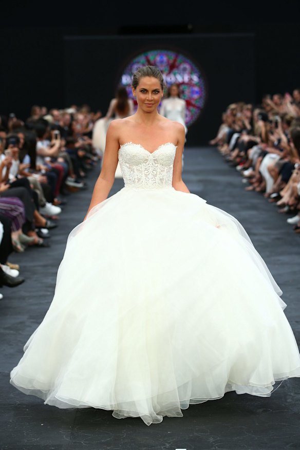 A model showcases designs by Monique Lhullier at the David Jones Autumn/Winter 2017 Fashion Launch at St Mary's Cathedral, Sydney, on February 1, 2017.