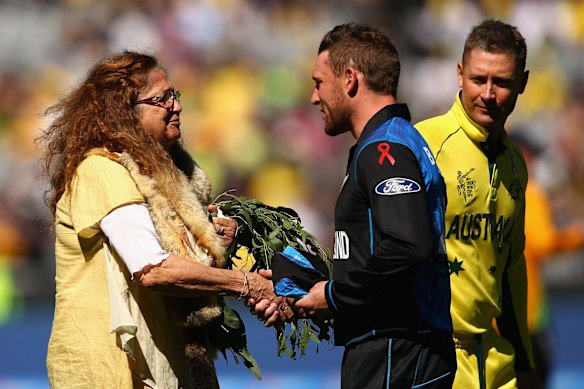 MELBOURNE, AUSTRALIA - MARCH 29:  New Zealand captain Brendon McCullum receives an indigenous welcome as Australian captain Michael Clarke walks past during the 2015 ICC Cricket World Cup final match between Australia and New Zealand at Melbourne Cricket Ground on March 29, 2015 in Melbourne, Australia.  