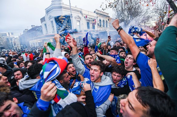 Italian soccer fans celebrate in Lygon Street, Carlton, after Italy won the Euro 2020 final against England at Wembley Stadium in London.