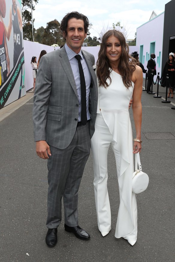 Hamish Lee and Rebecca Harding (wearing custom Witchery jumpsuit and head piece) at The Birdcage on Derby Day 2018.