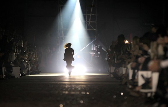 Designer Kym Ellery receives applause on the runway at the unveiling of the Ellery collection which launched Australian Fashion Week.