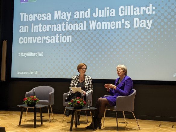 Former PMs: Julia Gillard talks to Theresa May in London on Tuesday.