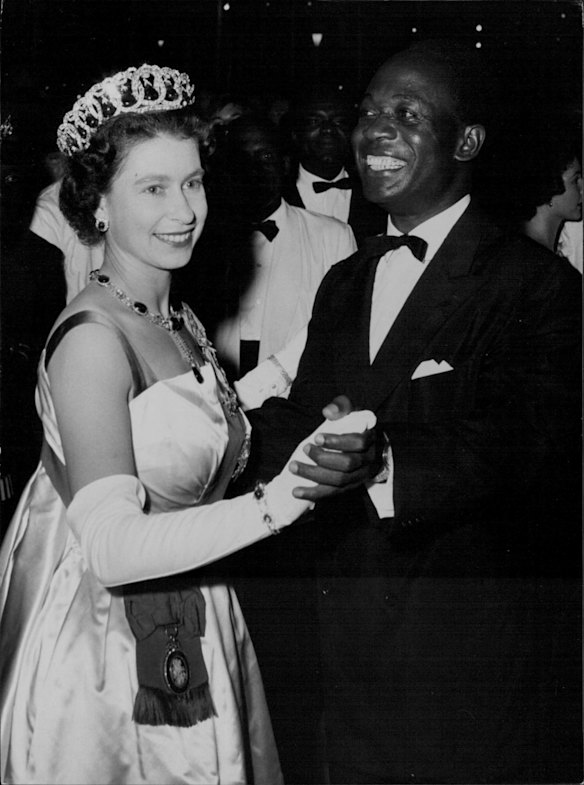 Queen Elizabeth II dances with President Nkrumah of Ghana. The monarch and Prince Philip have been visiting Ghana during their tour of West Africa, November 1, 1961.