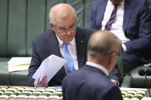 Prime Minister Scott Morrison looks up as Opposition Leader Anthony Albanese speaks during question time on Tuesday 1 June.