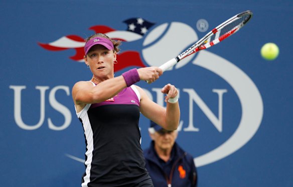 Samantha Stosur of Australia serves to Serena Williams during the women's championship match at the US Open.