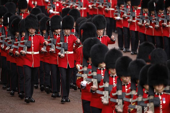 Soldiers march in the coronation procession.
