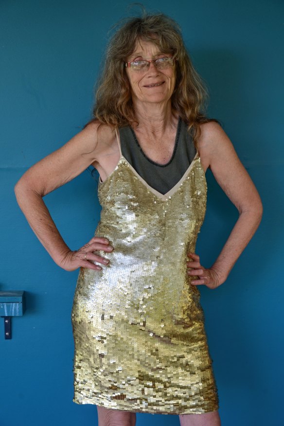 Jane Watson from Elands near Forster, is still not sure why she packed this gold sequined dress while fleeing the fires.