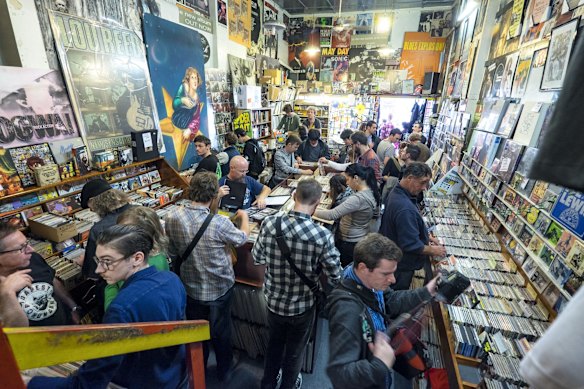 People wait for Paul Kelly to perform with Vika and Linda at Greville Records as part of World Record Day celebrations on April 18, 2015 in Melbourne, Australia.