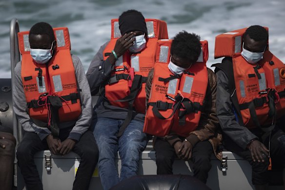 Migrant men arrive at Dover Port after being picked up in the English Channel by the Border Force on  in Dover, England. 