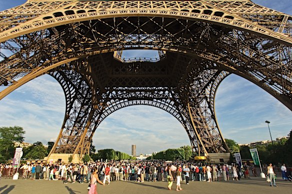 The impressive feet of the architectural feat that is the Eiffel Tower, Paris. 