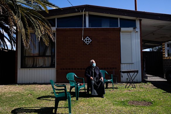 A resident of Fairfield Heights enjoys the sun, during Sydney's lockdown. 