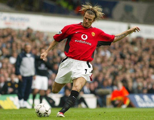 David Beckham fires over a cross in 2003.