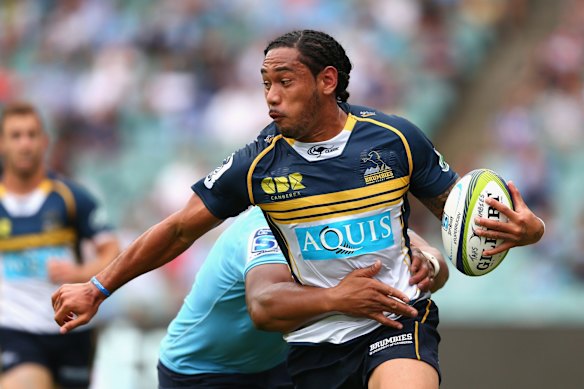 Joe Tomane of the Brumbies is tackled