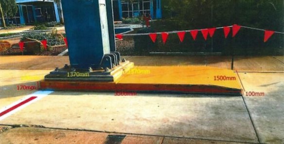 The raised concrete slab or plinth was cordoned off with bunting. 