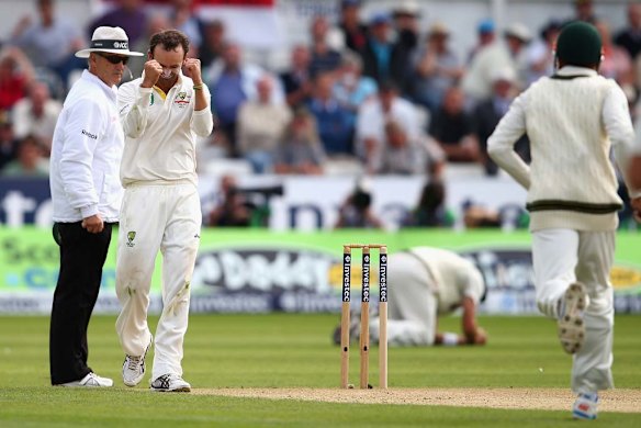 Nathan Lyon is ecstatic after taking the wicket of Ian Bell.