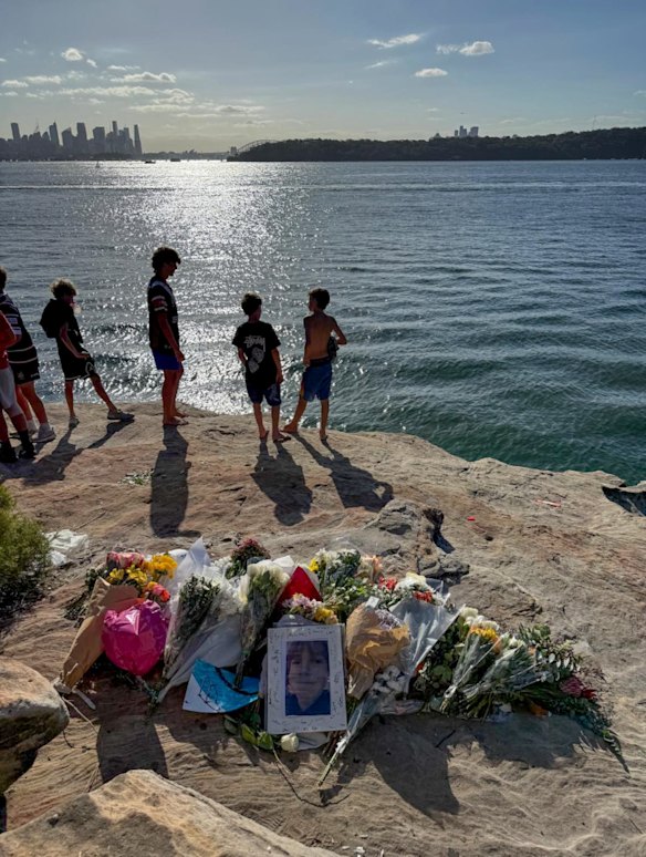 Friends of Nico Antic visit the scene of the shark attack at Vaucluse.