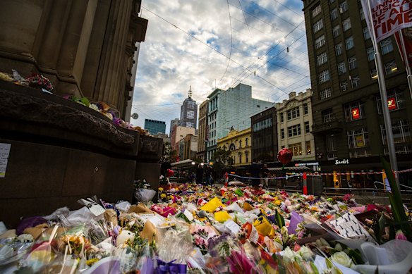 The sun struggles to shine over Bourke St mall. 