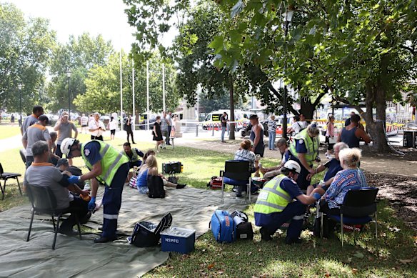 Injured attended to in local park, after a train hit a buffer at Richmond Station. 