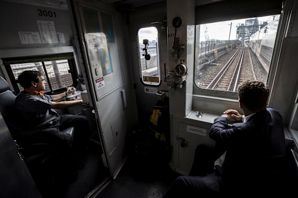 Minister for Transport and Roads Andrew Constance and driver Vince Vassiliou take a historic final S-Set trip over the Sydney Harbour Bridge.