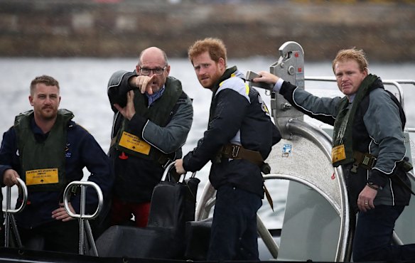 Patron of the Invictus Games Foundation Prince Harry watches an Invictus Games Sydney 2018 Sailing Event in Sydney Harbour on June 7, 2017 in Sydney, Australia.
