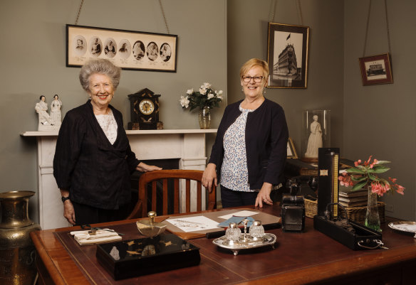 Elinor Wrobel, curator of Sydney's Lucy Osburn-Nightingale Museum,  and Marilyn Gendek, an expert on the history of Australian nursing, at Osburn's desk in the museum.