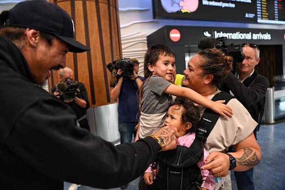 Lisa Te Tai and her granddaughter Manaia Taalili arrive in Auckland to be greeted by her son Marcelle Te Tai and his son.