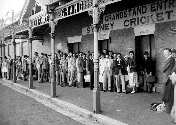 People queue for tickets at the grandstand entrance of the Sydney Cricket Ground during the 3rd Test between Australia and England on January 5, 1951. 
