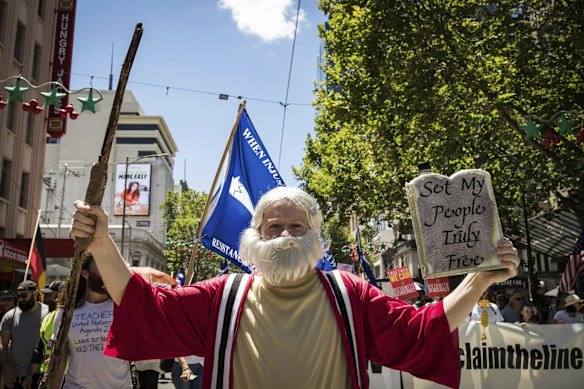 Protesters attend the Melbourne Freedom rally in the CBD