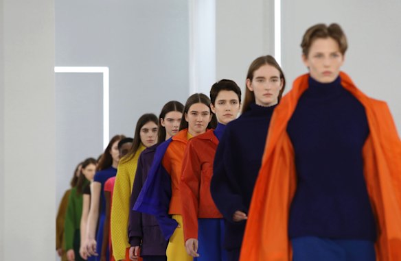 Models wear creations by Jasper Conran at the Autumn/Winter 2018 runway show in London.