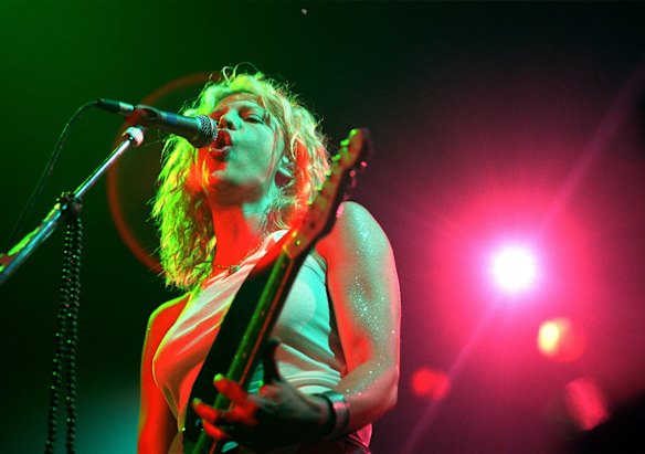 Courtney Love, lead singer of US rock band Hole, performs in 1999. 