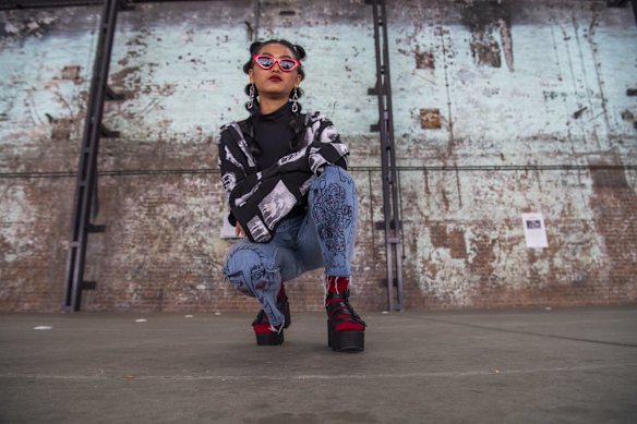 Dayana Oka wears own drawings on Cotton On pants, with Windsor Smith shoes.